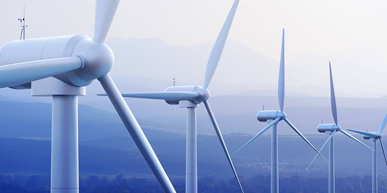 Wind turbines across open hills